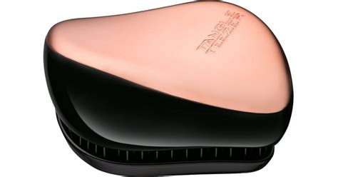 A Tangle Teezer Compact hajkefe.